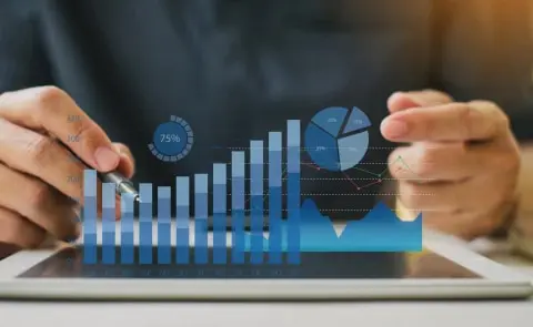 businessman-analyzing-company-financial-report-balance-with-digital-augmented-reality-graphics_480x295_acf_cropped